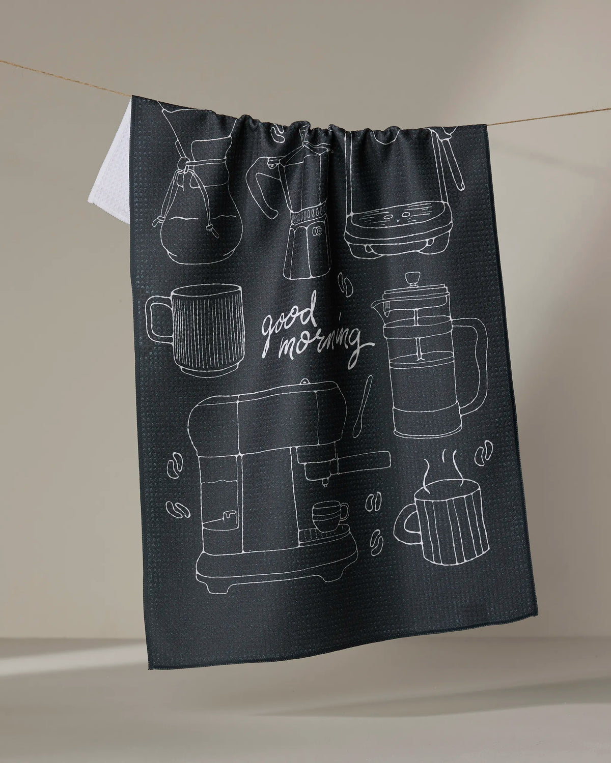 Geometry Good Morning Coffee tea towel laid flat with white coffee cup and pot line drawings on charcoal
