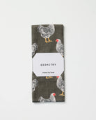 Geometry Hen House tea towel folded in its gift-ready Geometry packaging