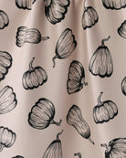 Close-up of the Geometry Hollow Season Halloween tea towel black hand-drawn pumpkins on blush