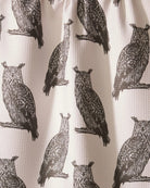 Close-up of the Geometry Nocturne tea towel gray owl print on creamy white