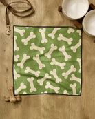 Geometry Park Run paw towel with cream dog bone print on green