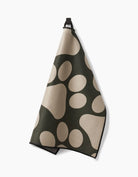 Geometry Paw Prints paw towel hanging from a hook by the door