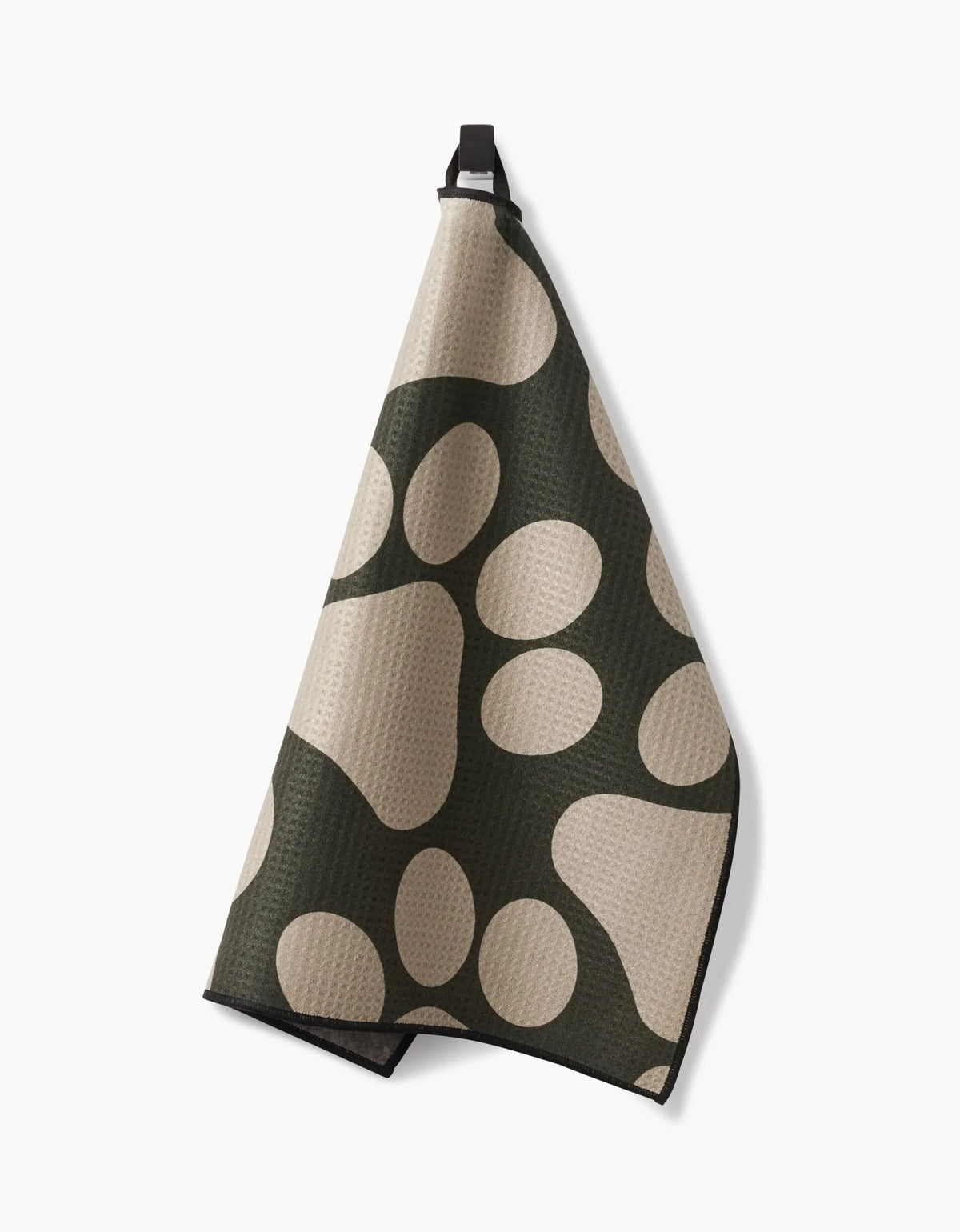 Geometry Paw Prints paw towel hanging from a hook by the door