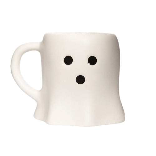 A white ceramic mug shaped like a ghost with a simple black face made of two dots on the upper front and one dot below, shown on a plain white background.