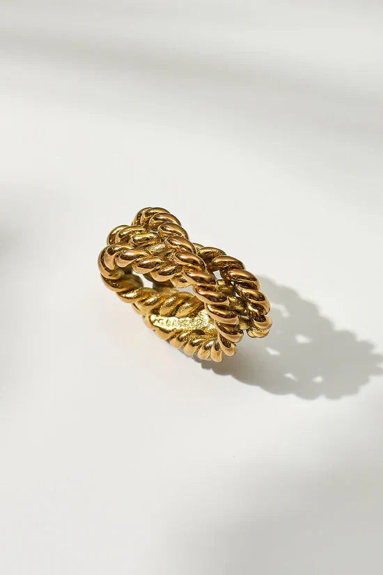 Gold braided slider on a white background