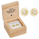 Sun-shaped earrings in a wooden box with 'You Make Me Happy' text