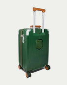 Green suitcase with brown handle and wheels on a white background