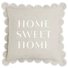 Beige pillow with 'HOME SWEET HOME' text on a white background