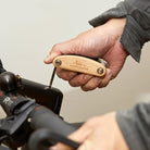 Adjusting a bicycle with the Kikkerland 16 in 1 bike tool