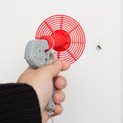 Hand using the Kikkerland Bug Blaster