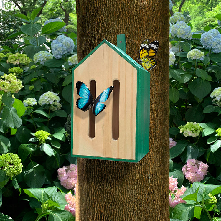 Kikkerland Little Butterfly House mounted on a tree in the garden
