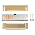 Parts of the Kikkerland make your own harmonica kit laid out