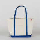 White tote bag with blue accents on a light gray background