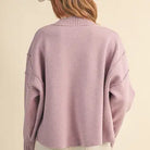 Back view of the &merci Mock Neck Ribbed Sweater in lavender with drop shoulders and ribbed hem