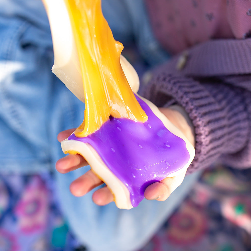 Mushmeez PB&J toast taba squishy being stretched to show its soft, sticky texture