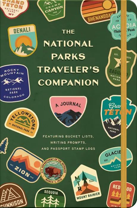 Journal with national park badges on a green cover