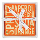 An orange square gift box containing a matching orange square item, tied with a white ribbon printed with 'BARBARA STUDIO'. The front features large gold foil text reading 'SPIRIT NAPEROL SECCO ORANGE'.