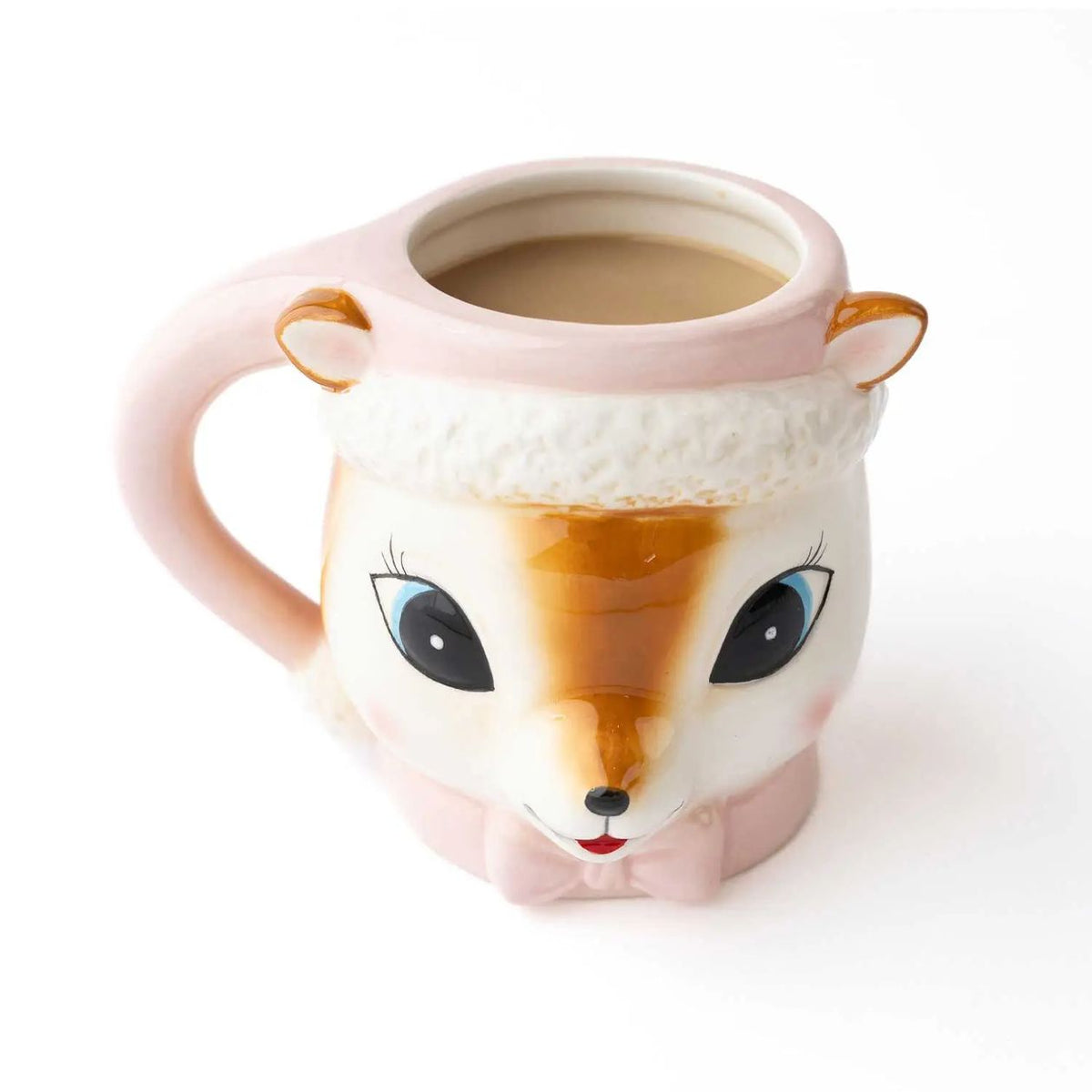 Pink ceramic reindeer coffee mug with brown reindeer face, big eyes, ears, and a white Santa hat brim
