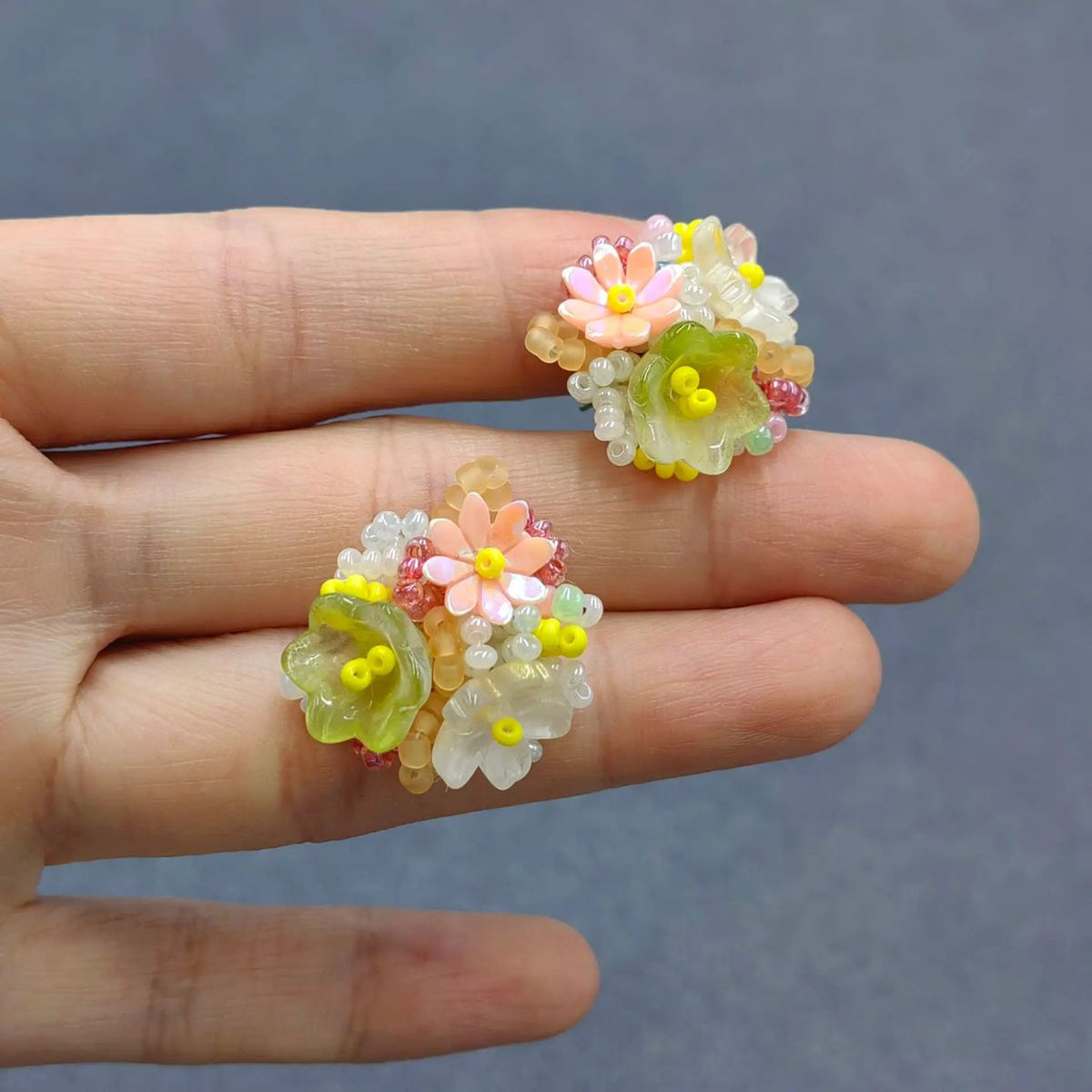 Colorful seed bead flower stud earrings in multicolor design