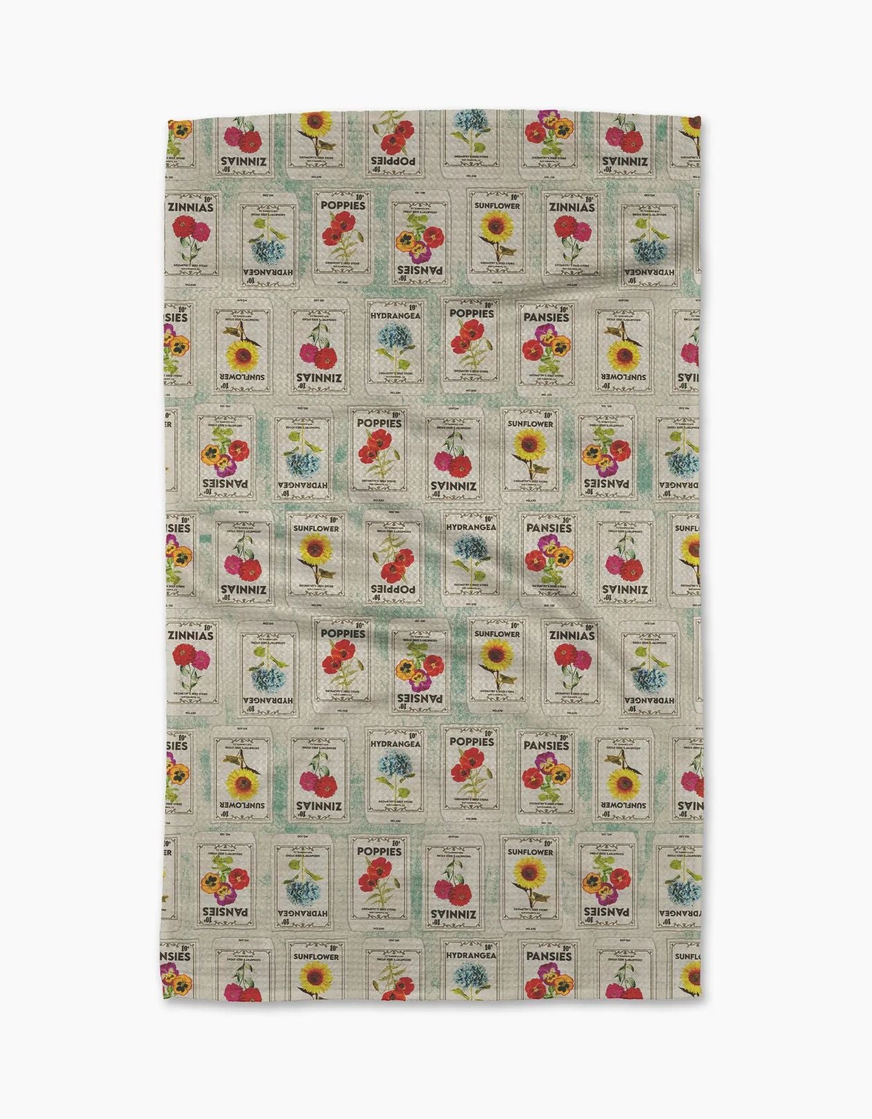 Tea towel with vintage-style seed packet design on a white background
