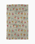 Tea towel with vintage-style seed packet design on a white background