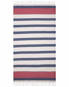 Striped rug with red, blue, and white pattern on a white background