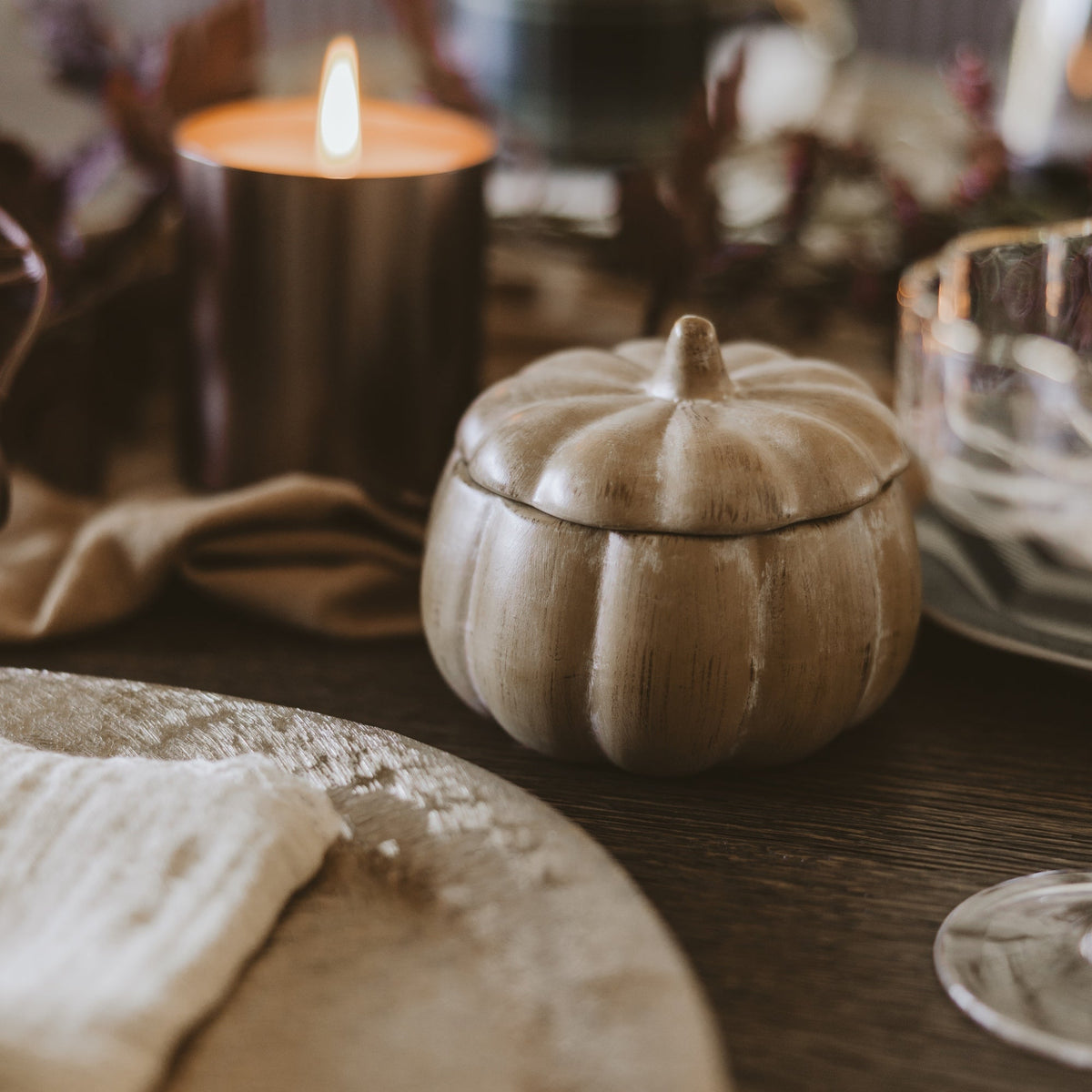 Pumpkin Spice ceramic pumpkin candle styled on a fall table