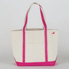 Beige tote bag with pink trim on a white background