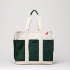 Tote bag with green and white sections on a light gray background