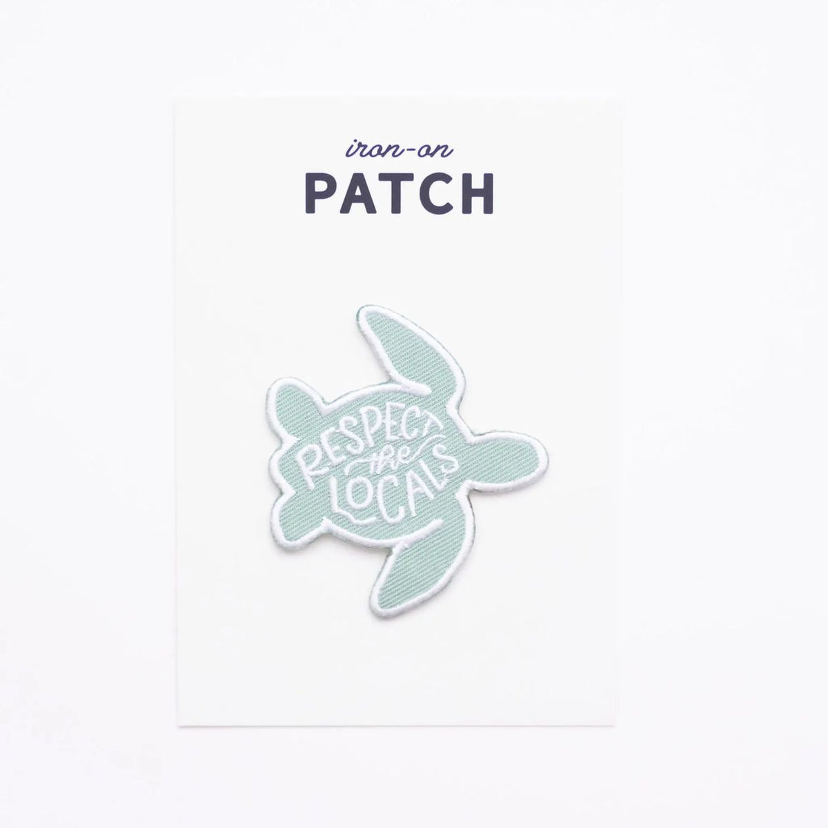 Turtle-shaped patch with 'Respect the Locals' text on a white background