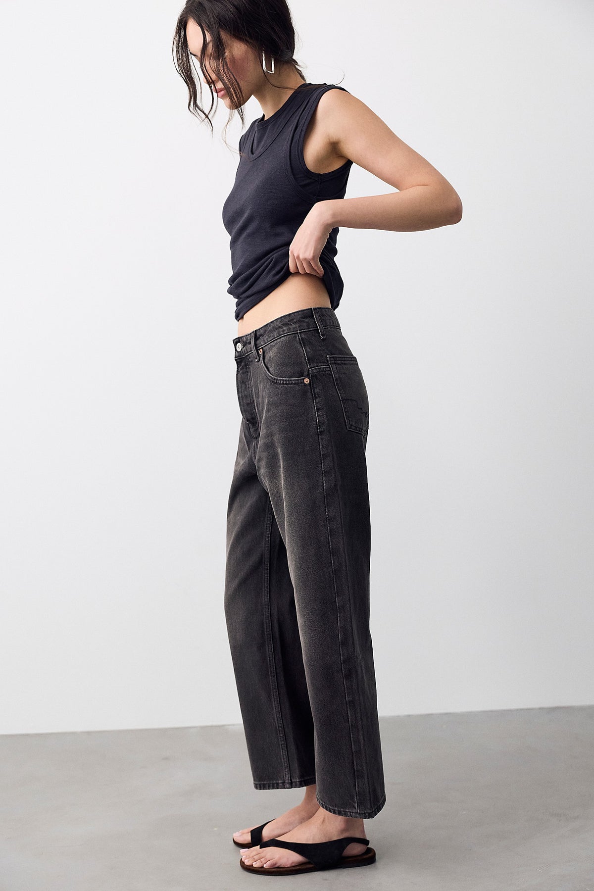 Side view of the Deep Trance Dropped Boyfriend Jeans in Hypnosis showing the low-rise slouchy barrel leg